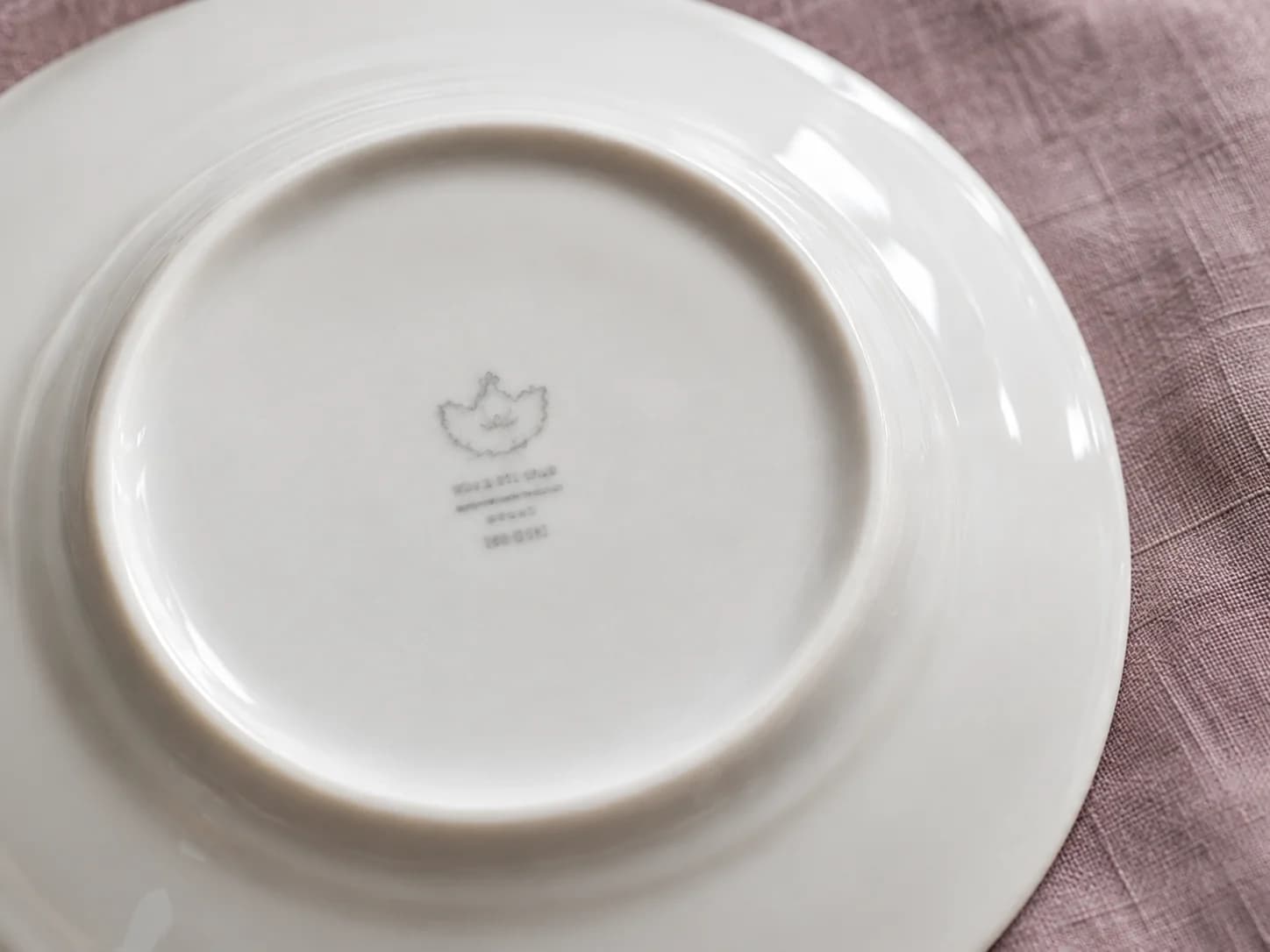 Illustrative underside of a plate showing where a maker mark may appear